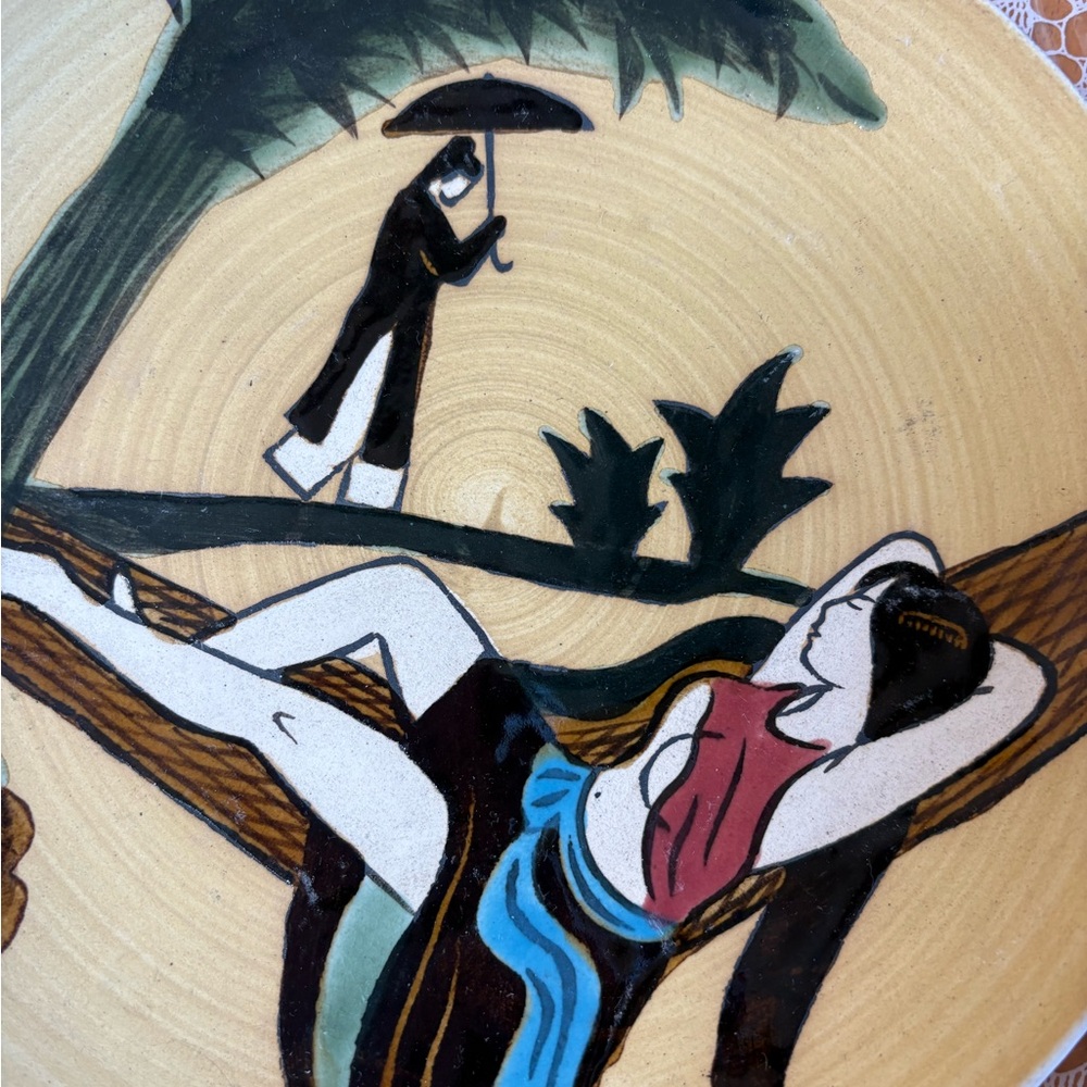 hand-painted ceramic art plate a girl relaxing in hammock & a person strolling